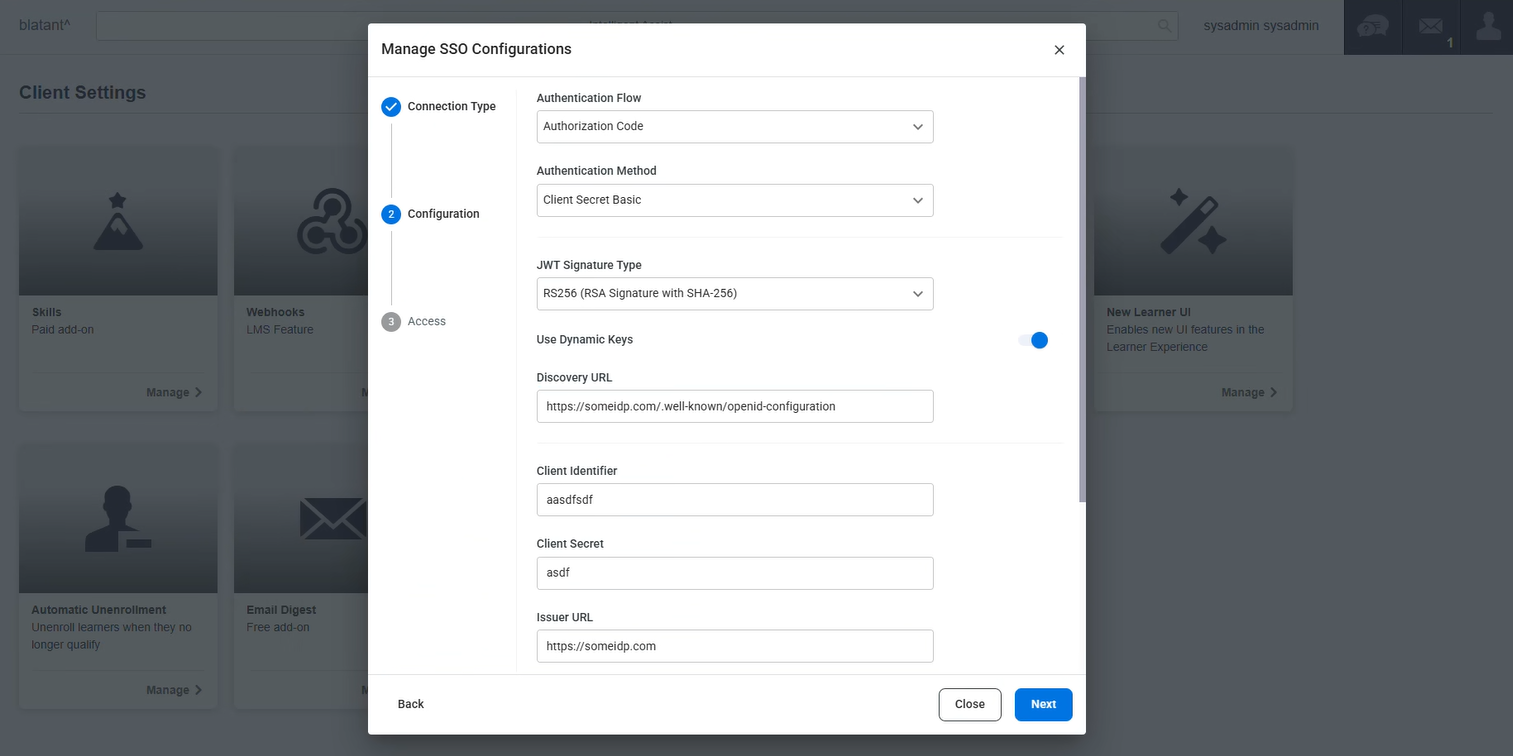 OIDC configuration in Absorb LMS showing RS256 selected with Use Dynamic Keys enabled and Discovery URL available.